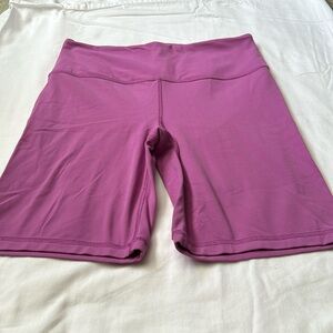 Athleta brand yoga or stretch Shorts. Purple size M